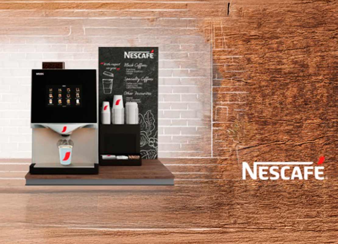 Máquina de café NESCAFÉ® en un cover con vasos, tapas, endulzantes y material POP
