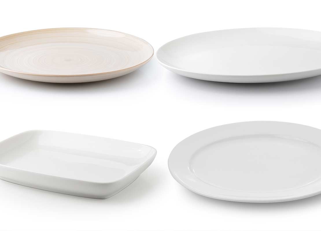Diferentes estilos de platos de porcelana y cerámica, mostrando tipos de vajilla para mesa formal y casual