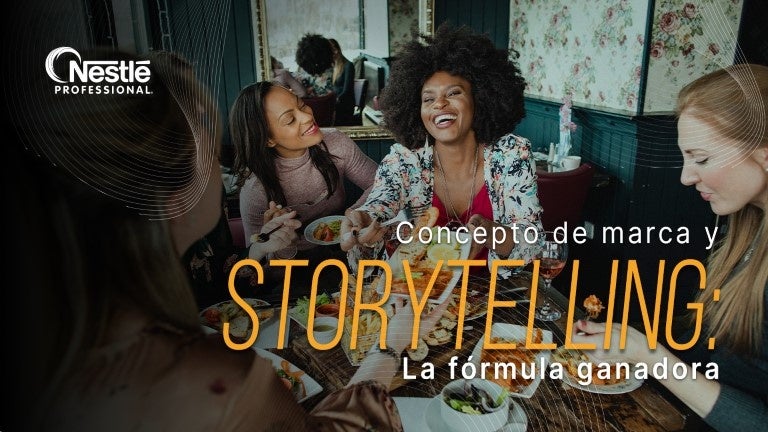 Grupo de personas compartiendo comida en un restaurante, ilustrando conexión y concepto de marca