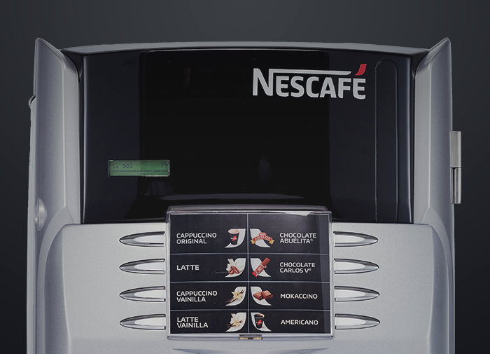 Primer plano de la máquina de café NESCAFÉ® 860 con varias opciones de bebidas mostradas en botones.