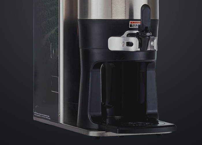Dispensador de máquina NESCAFÉ® Boxha en primer plano