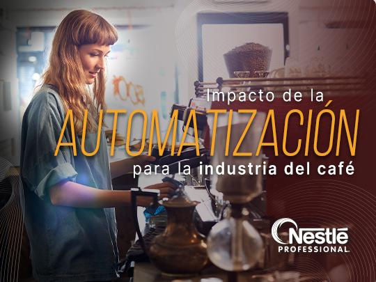 Barista prepara café con equipos automatizados en una cafetería moderna